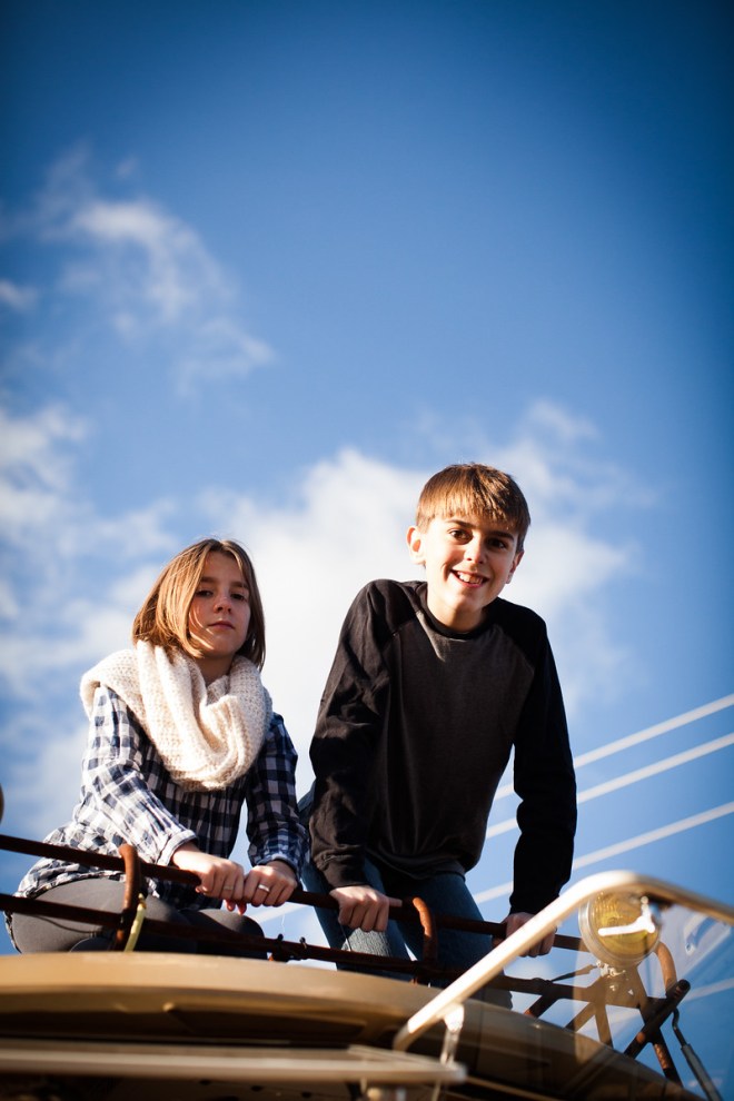 shane and ella on top of the bus